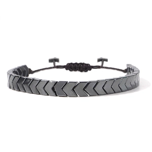 Adjustable hematite arrow bead bracelet with black woven cord in a geometric street style