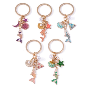 Set of 5 golden mermaid keychains with colorful sea shells, pearls, and starfish charms