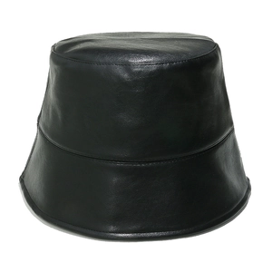 Close-up of the smooth black PU leather texture and fine stitching on the bucket hat
