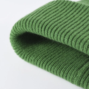Thick dark green wool knit beanie for men and women featuring warm ribbed texture design