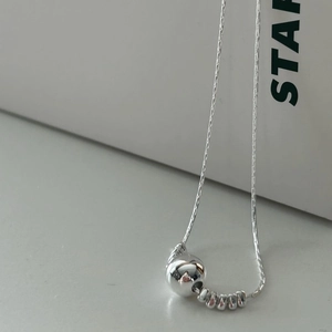 Minimalist S925 sterling silver beaded necklace with sleek spherical pendant and ring detail