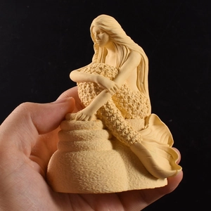 Detailed view of 3D mermaid sculpture mold featuring intricate texture and matte finish