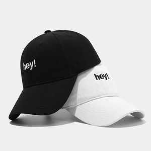 Classic cotton baseball caps in black and white with minimalist hey embroidery