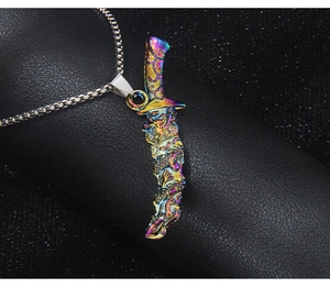 Macro shot of rainbow sword pendant with dragon totem on black leather texture