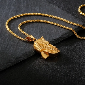 Detailed close-up of 18K gold-plated Pharaoh pendant on a twisted rope chain necklace