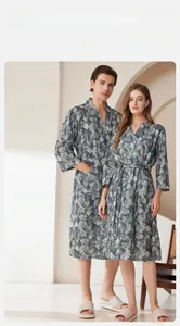 Detail of palm leaf print bathrobe with kimono collar and convenient side pockets