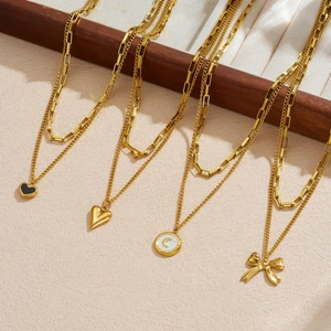 Vintage double layer gold plated stainless steel necklace with heart and bow pendants