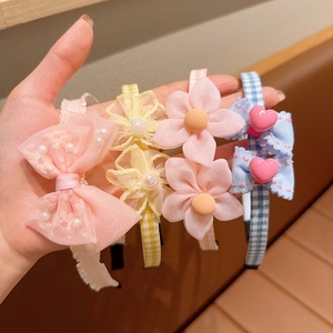 Set of four cute girls princess headbands with lace bows and pearl flower decorations