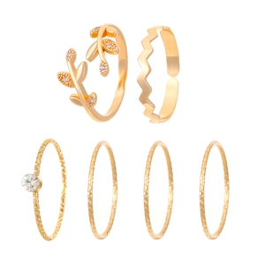 6pcs minimalist gold ring set featuring leaf shape and gemstone on white background