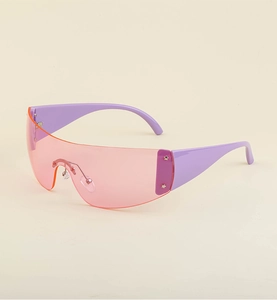 Close-up of pink Y2K shield sunglasses with purple temples and small rivet details
