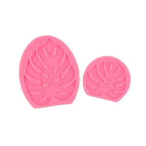 Pink monstera leaf silicone molds for fondant, chocolate, and resin craft in two sizes