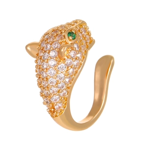 Golden leopard head ear cuff with micro-pave zircons and emerald green gemstone eyes