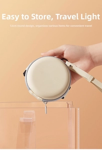 Kompaktes beige-rundes Brillenetui mit Reißverschluss und praktischer Handschlaufe
