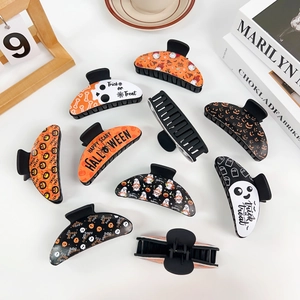 Gothic Halloween hair claw clip set featuring pumpkin ghost and skull patterns