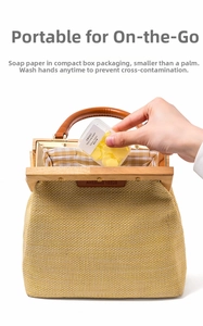 Close-up of portable lemon-scented yellow soap petals in a clear travel case