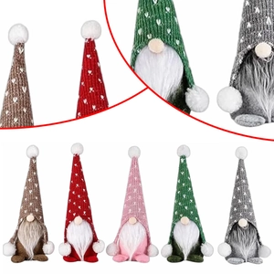 Detail showing five colorful knit Christmas gnomes with long hats and faux fur beards