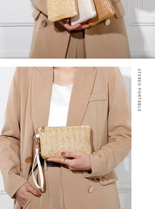 Detail of woven straw clutch bag with wave texture, golden zipper and wrist strap