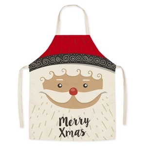 Dettaglio del grembiule natalizio in lino con stampa Babbo Natale e scritta Merry Xmas