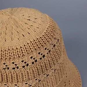 Breathable hollow knit bucket hat for women in beige featuring a minimalist summer style