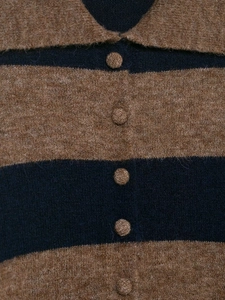 Close-up of caramel and navy striped knit cardigan with textured wool-blend fabric