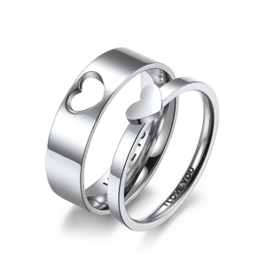 Polished stainless steel couple ring set with hollow heart and I Love You engraving