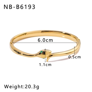 Detailed view of snake-shaped bangle with dimensions and weight specs in gold finish