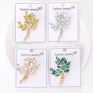 Detailed four-piece set of wheat ear brooches with sparkling crystals in assorted colors