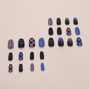 24-piece graffiti style press-on nails featuring heart flame and checkerboard patterns