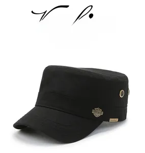 Detail of black cotton military cap with side metal eyelets and a classic sport badge