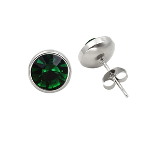 Close-up of vintage emerald green round stud earrings with silver 18K gold base
