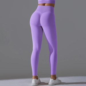 Detail view of purple high waist seamless yoga leggings with scrunch butt lifting design