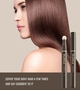 Detail view of brown hair touch-up stick covering gray hair on a female model