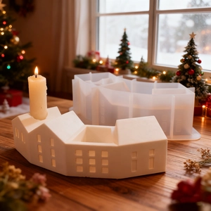 Nordic house shape silicone mold and white resin candle holder in a festive setting
