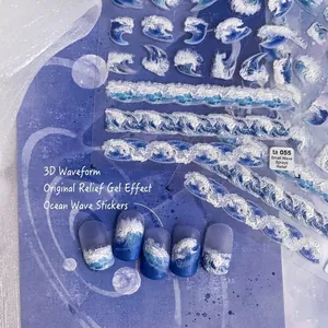 Embossed 3D ocean wave nail art stickers with blue and white sea patterns for manicures
