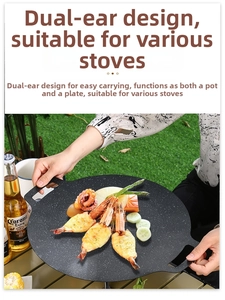 Detail of round Maifan stone non-stick grill pan with handles used in outdoor camping