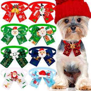 Detail showing various Christmas pet bow ties with Santa Claus and reindeer ornaments