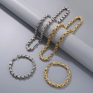 Detail of four-piece Byzantine chain set with gold and silver necklaces and bracelets