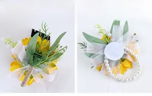 Rear view of sunflower wedding corsage with safety pin and wrist flower with pearl band