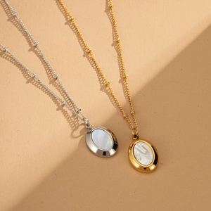 Polished titanium steel necklaces with oval shell pendants in gold and silver colors