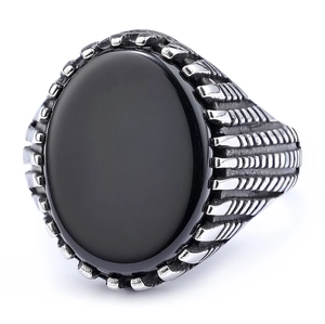 Vintage stainless steel ring for men featuring an oval black stone and textured band