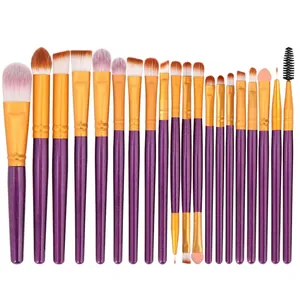 Detail of 20pcs professional makeup brushes with purple glitter handles and gold ferrules