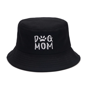 Classic black cotton bucket hat featuring white DOG MOM embroidery and paw print design
