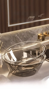 Macro shot of two stacked transparent thick basins with premium crystal-like finish