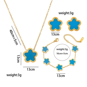 Detail of 18KGP gold flower jewelry set including necklace bracelet and stud earrings