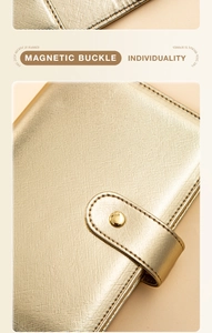 Macro detail of high-quality PU leather texture and golden magnetic buckle on notebook
