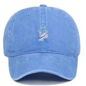Close-up of ghost skateboard embroidery on blue washed cotton vintage baseball cap
