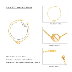 Detailed macro shot of gold stainless steel bracelet with hexagonal charm and buckle