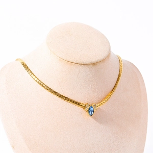 Elegant gold snake chain necklace with a blue teardrop marquise cubic zirconia pendant