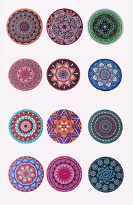 Detailed view of 12 vibrant mandala diamond painting coasters with bohemian patterns