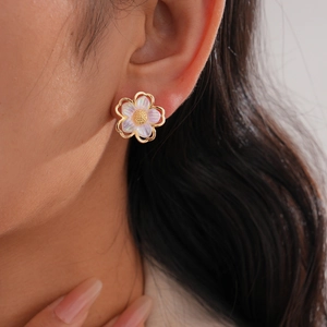 Exquisite gold floral earrings with shimmering pearl petals for women's elegant style
